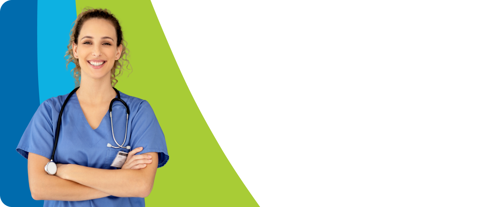 A friendly female nurse in blue scrubs stands with her arms crossed and a stethoscope around her neck.