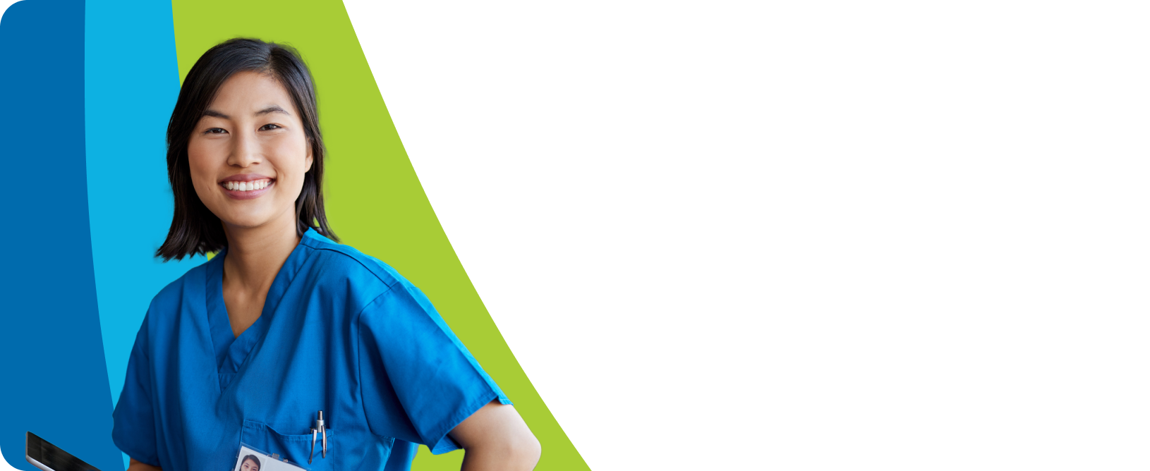 A friendly female nurse in blue scrubs smiles at the camera.